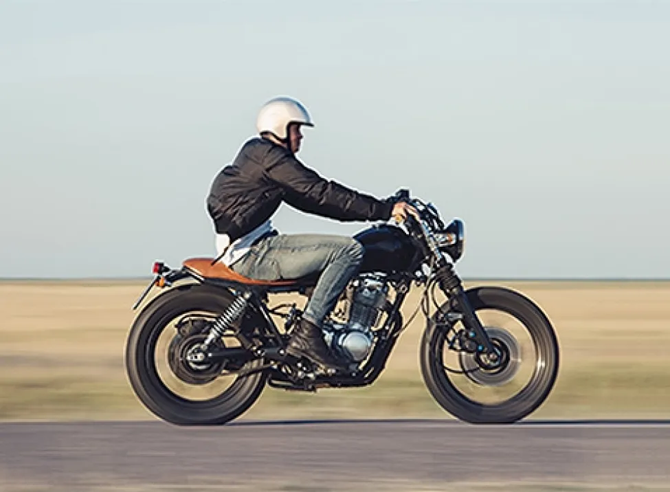 Motorcyclist driving on the road